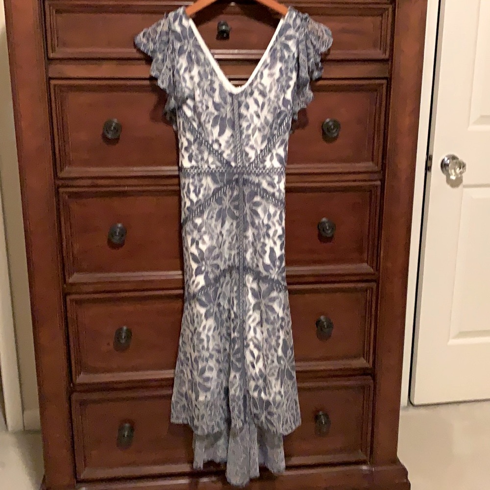 Smokey blue lace dress with white lining.